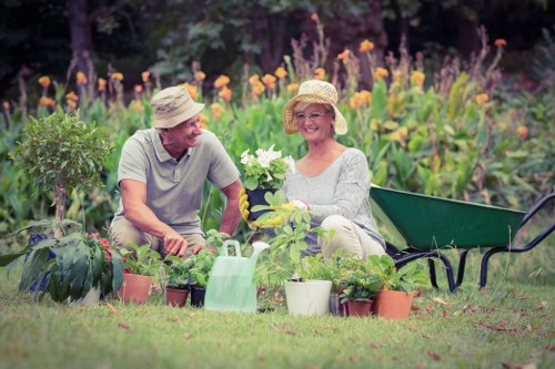 Professional gardener pruning plants in Hatch End